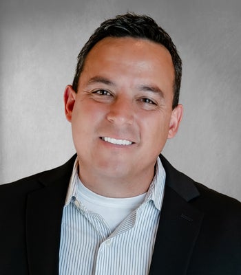 Portrait of DJ Baca, Broker Associate, REALTOR® .