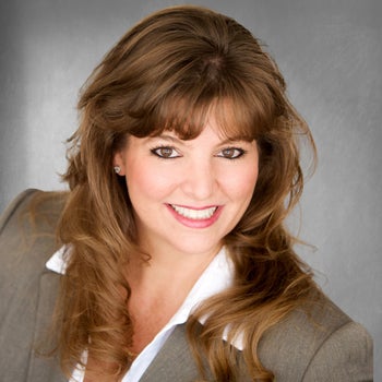 Portrait of Leigh Gauger, Senior Broker Associate, CNE